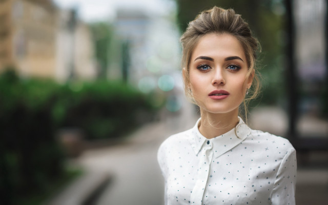 Woman bun white shirt city free wallpaper for desktop - medium preview image