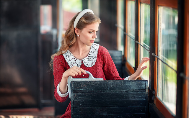 Woman looking window train suitcase free wallpaper for desktop - medium preview image