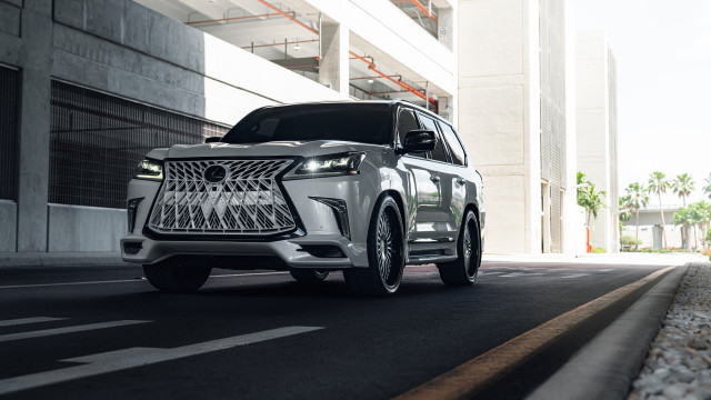 White suv street tall building free wallpaper for desktop - medium preview image