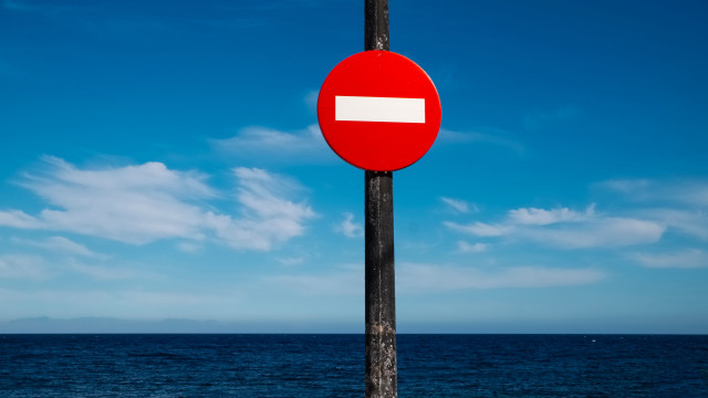 Red sign ocean blue sky free wallpaper for desktop - medium preview image