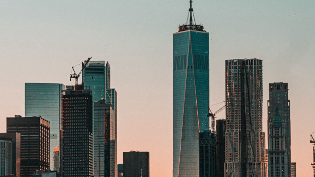 City skyline plane tall building free wallpaper for desktop - medium preview image