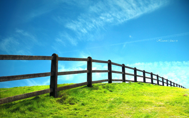Wooden fence grassy hill mountain free wallpaper for desktop - medium preview image