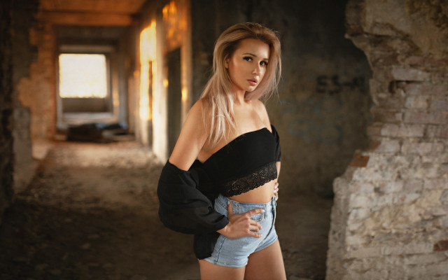 Blonde woman denim shorts brick free wallpaper for desktop - medium preview image