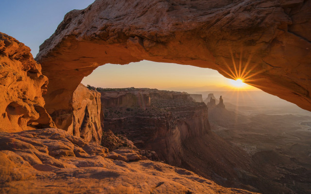 Sunset arch rock formation orange free wallpaper for desktop - medium preview image
