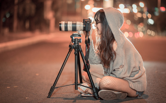 Woman camera tripod sitting fishnet free wallpaper for desktop - medium preview image