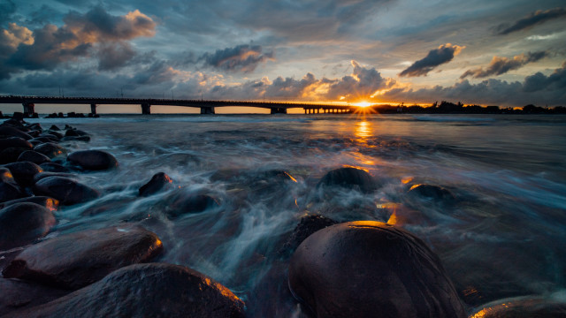 Bridge sunset water rocks dusk free wallpaper for desktop - medium preview image