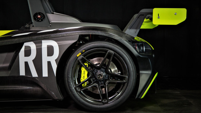 Sportscar closeup blackbackground yellowwheel superflat free wallpaper for desktop - medium preview image