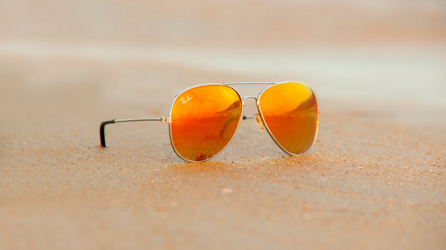 Sunglasses beach ocean sand sky free wallpaper for desktop - medium preview image