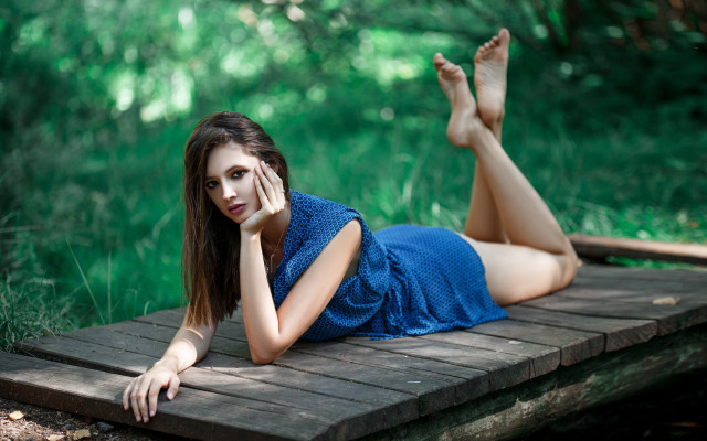 Woman woodland laying blue dress free wallpaper for desktop - medium preview image