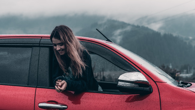 Woman red car window smiling free wallpaper for desktop - medium preview image
