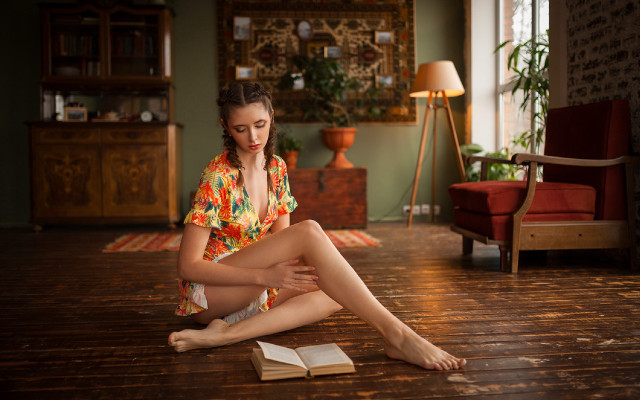 Woman sitting book lamp redchair free wallpaper for desktop - medium preview image