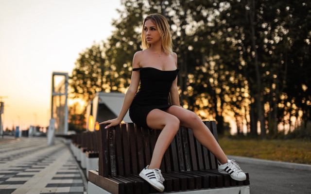 Woman bench crossed legs portrait free wallpaper for desktop - medium preview image