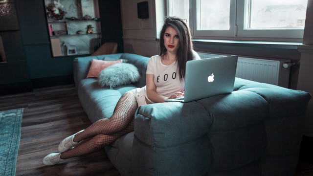 Woman laptop fishnet couch fashion free wallpaper for desktop - medium preview image