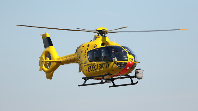 Yellow helicopter blue sky pilot free wallpaper for desktop - medium preview image