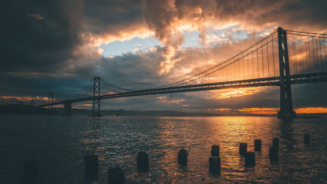 Bridge water sky clouds cityscape free wallpaper for desktop - medium preview image