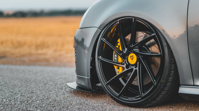 Car tire road grass sky free wallpaper for desktop - medium preview image