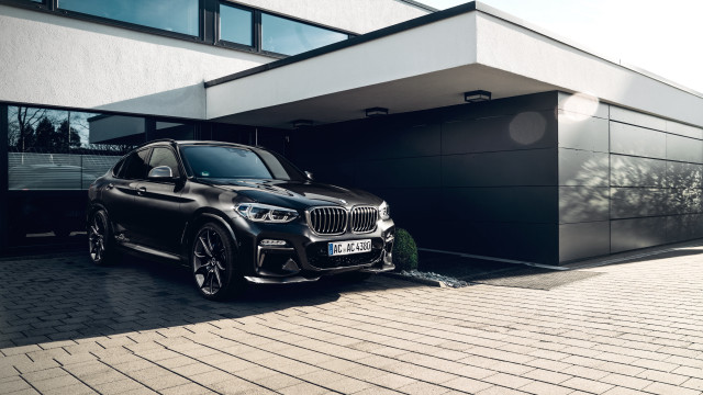 Black car building garage tree free wallpaper for desktop - medium preview image