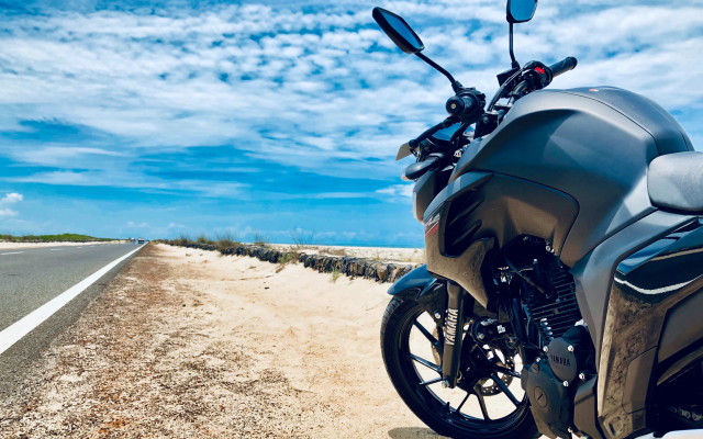 Motorcycle beach road blue sky free wallpaper for desktop - medium preview image
