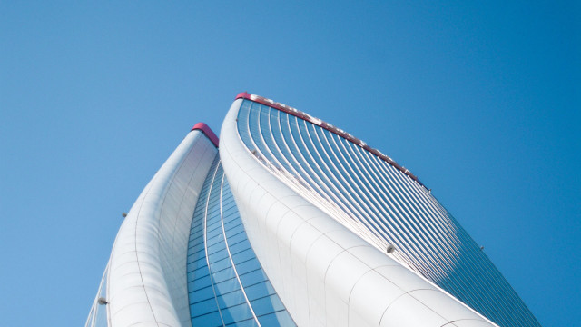 Tall building curved roof sky free wallpaper for desktop - medium preview image