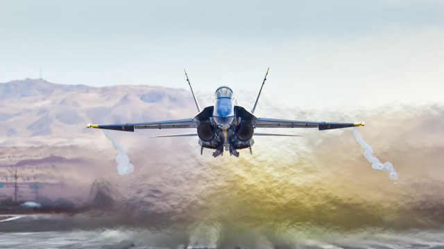Jet over water mountains smoke free wallpaper for desktop - medium preview image