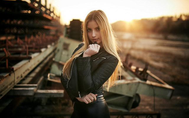 Woman leather outfit train sunset free wallpaper for desktop - medium preview image