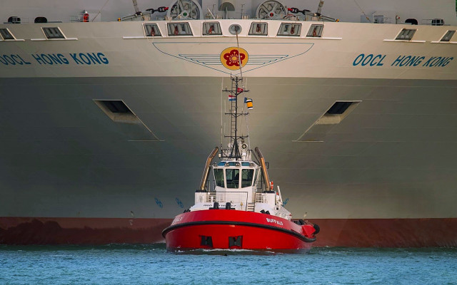 Large boat near ship flag free wallpaper for desktop - medium preview image