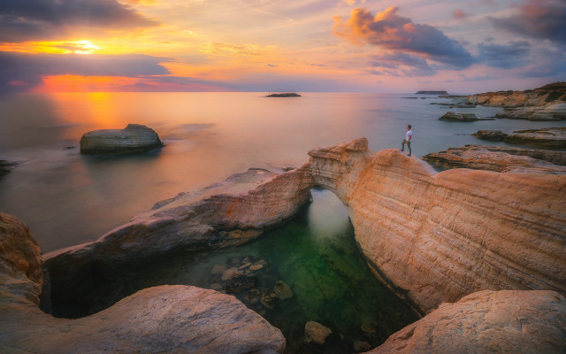 Ocean sunset rock formation mountain free wallpaper for desktop - medium preview image