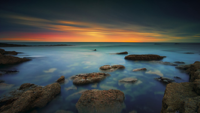 Sunset ocean rocks mooring colours free wallpaper for desktop - medium preview image