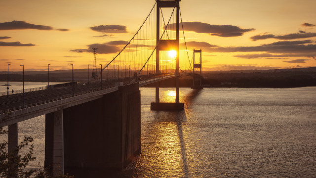 Bridge sunset water lighthouse city free wallpaper for desktop - medium preview image