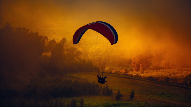 Parasailing field sunset parachute cinematic free wallpaper for desktop - medium preview image