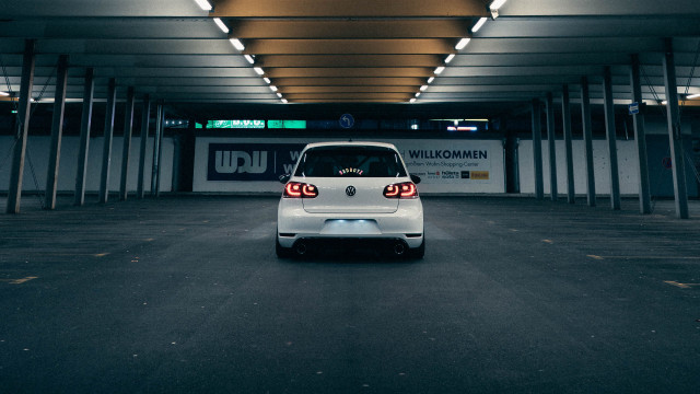 White car parking garage wild free wallpaper for desktop - medium preview image
