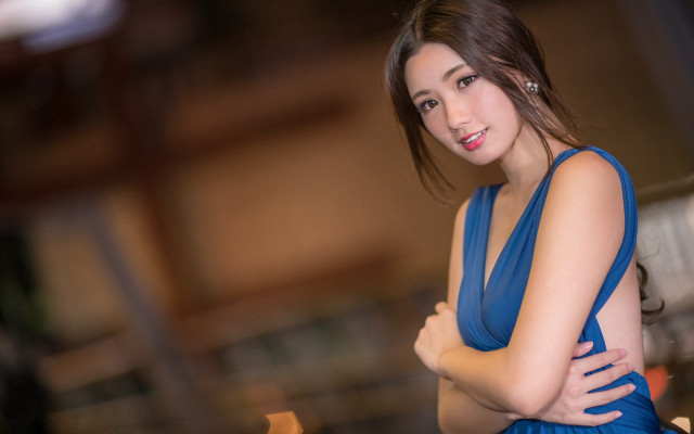 Woman blue dress crossed arms free wallpaper for desktop - medium preview image