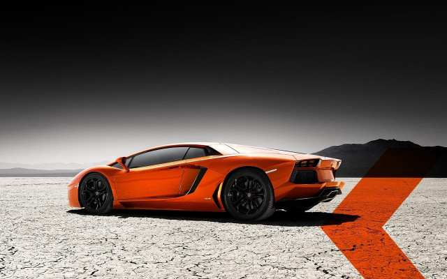 Orange sports car desert black free wallpaper for desktop - medium preview image