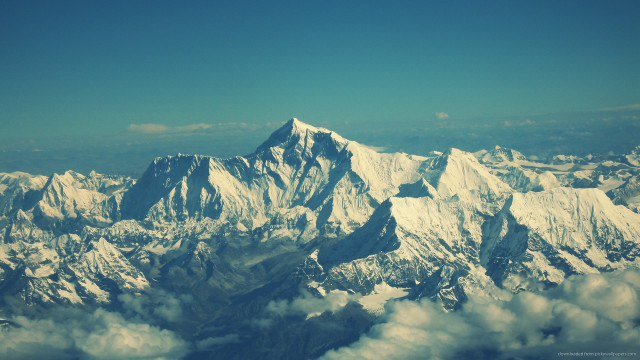 Mountain range airplane window clouds free wallpaper for desktop - medium preview image