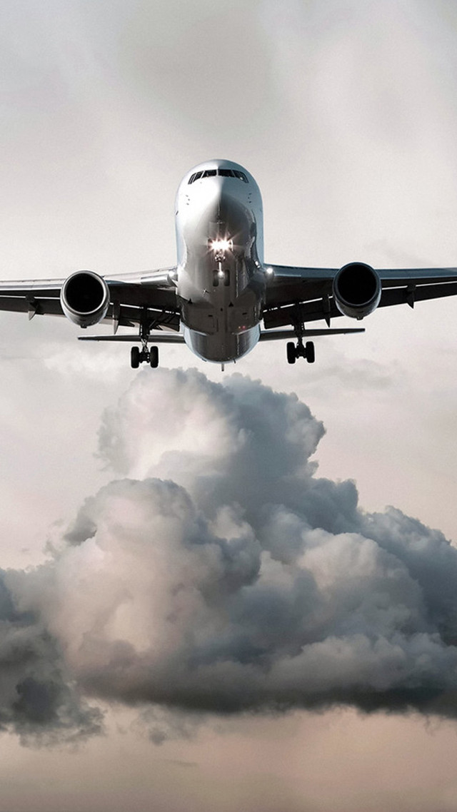 Jetliner cloudy sky runway engine free wallpaper for mobile - medium preview image