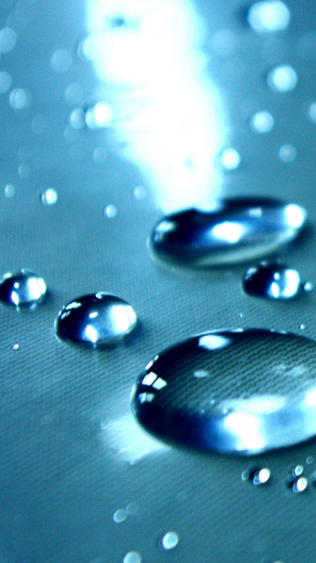 Water droplets closeup blue background free wallpaper for mobile - medium preview image