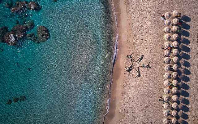 Beach people umbrellas flowers starry free wallpaper for desktop - medium preview image