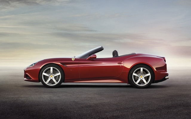 Red sports car concrete sky free wallpaper for desktop - medium preview image