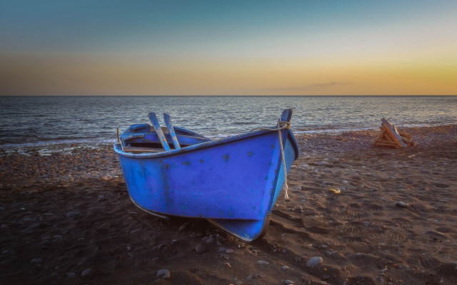 Blue boat beach sunset ocean free wallpaper for desktop - medium preview image