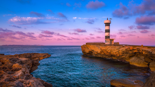 Lighthouse cliff ocean sunset pink free wallpaper for desktop - medium preview image