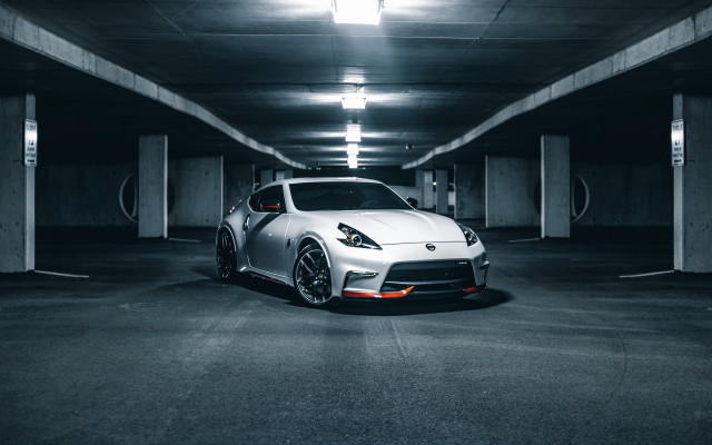 White sports car parking garage #2 free wallpaper for desktop - medium preview image