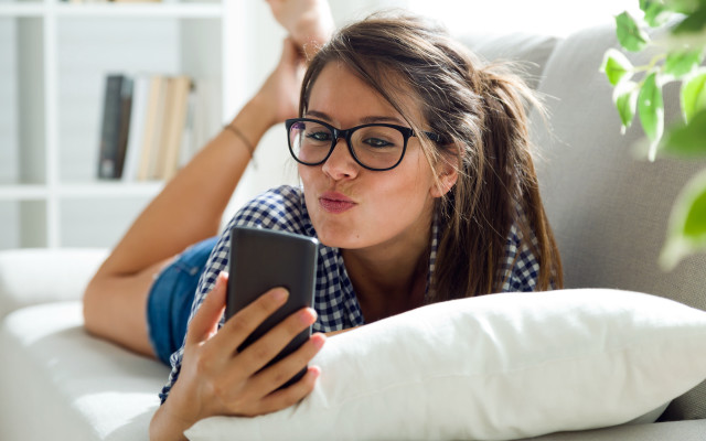 Woman couch phone pillow bookcase free wallpaper for desktop - medium preview image