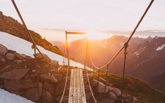 Suspension bridge mountains sunset limital free wallpaper for desktop - medium preview image