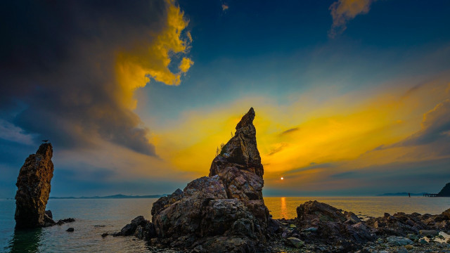Rock formation ocean sunset clouds free wallpaper for desktop - medium preview image