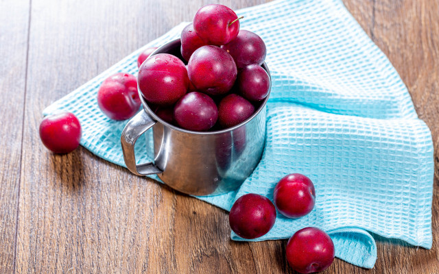 Metal cup cherries wooden table free wallpaper for desktop - medium preview image