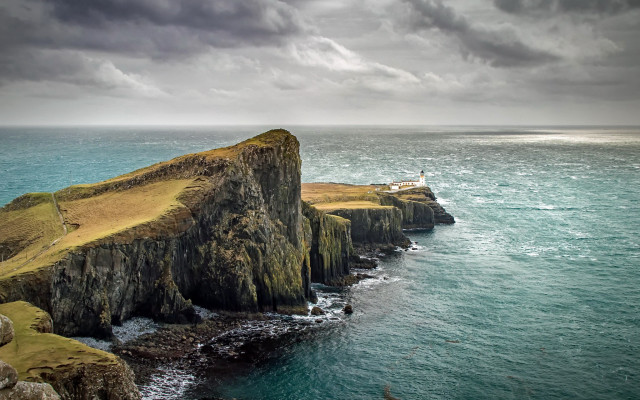 Lighthouse cliff ocean cloudy sky #4 free wallpaper for desktop - medium preview image
