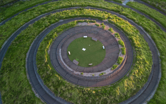 Circular grassy area lawn building free wallpaper for desktop - medium preview image