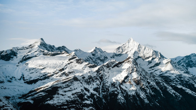 Mountain range snow capped horizon free wallpaper for desktop - medium preview image