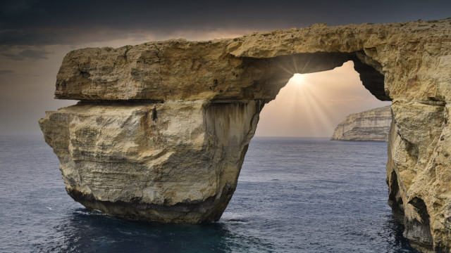 Ocean rock formation sunbeam matte free wallpaper for desktop - medium preview image