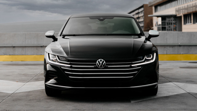 Black car parking lot futurism free wallpaper for desktop - medium preview image